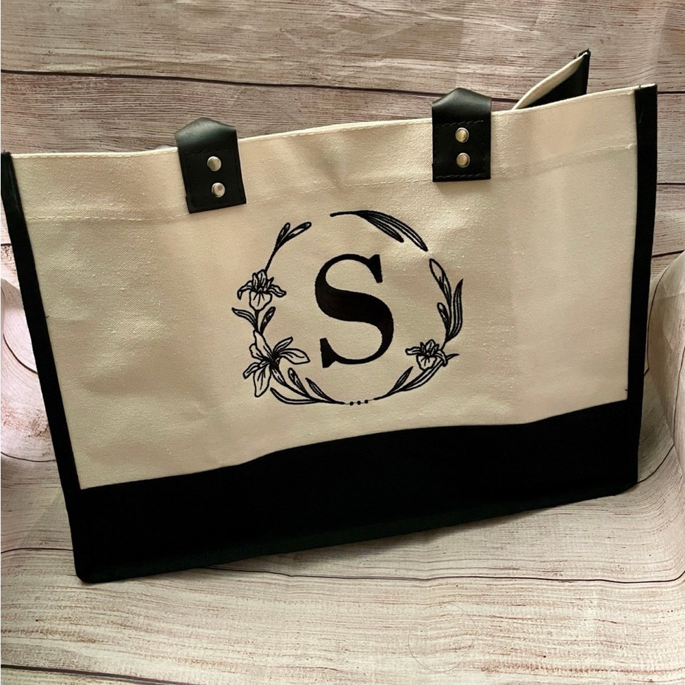 Beige Canvas Tote bag with black accents, embroidered with S initial in black